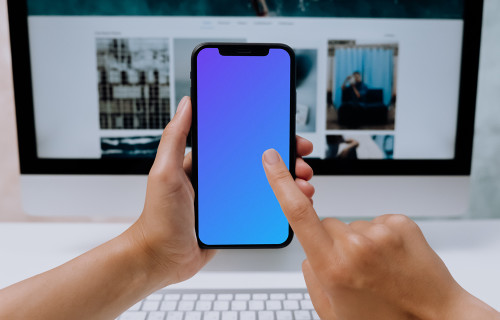 Person hands typing on an iPhone 12 mockup