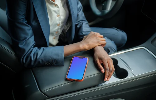 Businesswoman and iPhone mockup in Tesla