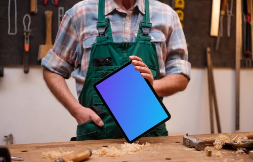 iPad Air held by the carpenter