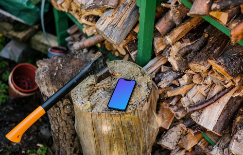 iPhone 13 mockup on a tree stump