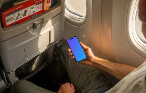 iPhone 14 Pro gratuit à bord d'un avion Mockup