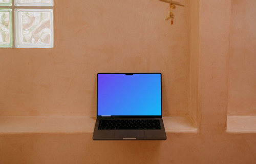 MacBook Air mockup next to a window 