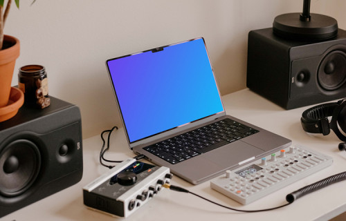 MacBook Pro mockup in the small podcast studio