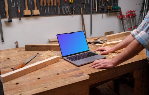 MacBook Pro mockup on a wooden desk