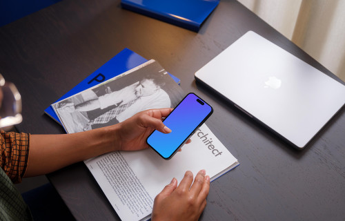 Person typing on a iPhone 14 Pro mockup