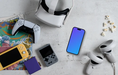 Smartphone mockup amidst gaming gear and snacks