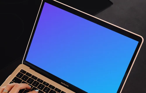Woman hands typing on a MacBook Air mockup