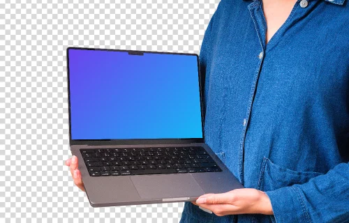 Woman in denim shirt holding opened MacBook mockup
