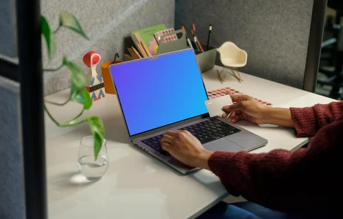 Woman working on a MacBook Pro 14 mockup
