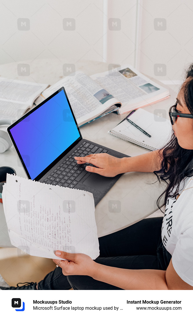 Microsoft Surface laptop mockup used by a lady in glasses