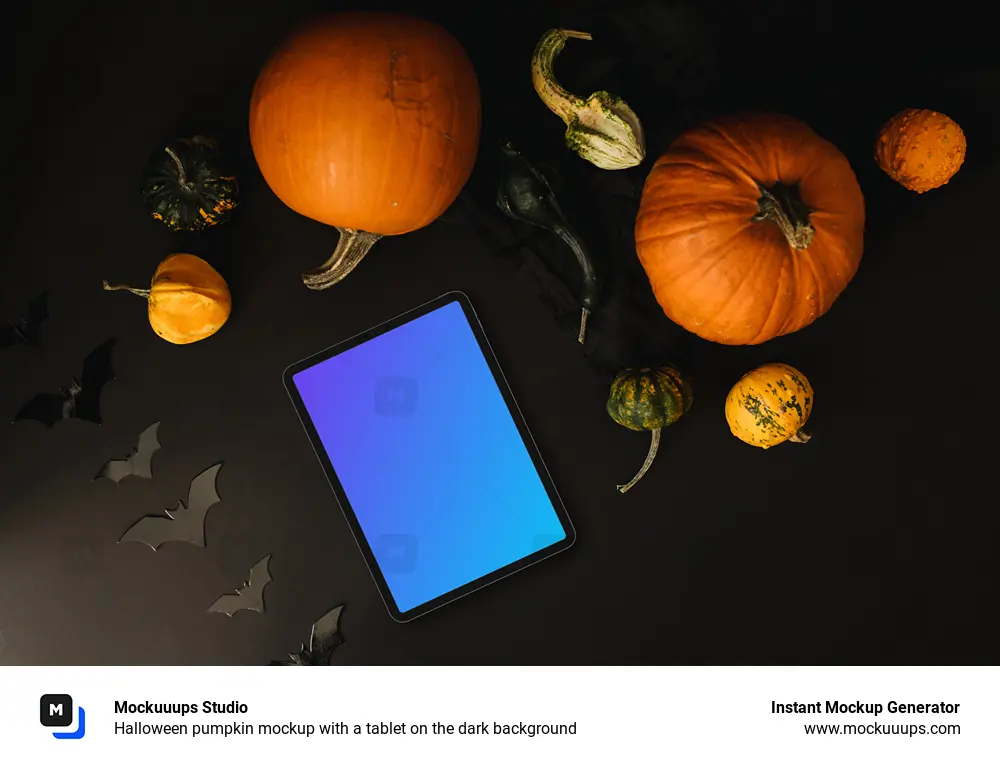 Halloween pumpkin mockup with a tablet on the dark background
