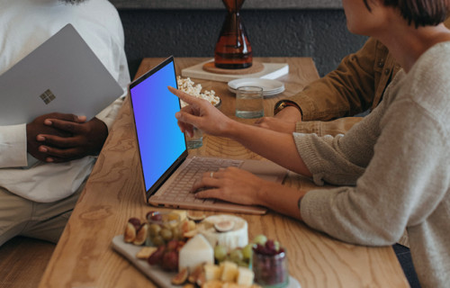 Microsoft Surface laptop mockup with multiple users