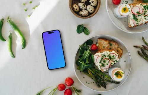 Smartphone mockup on a table with an Easter meal