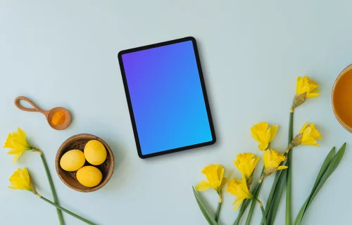 Tablet mockup with yellow Easter eggs