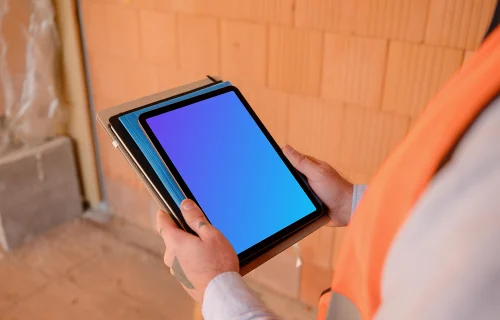 Construction worker holding an iPad mockup