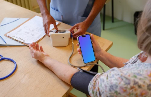 iPhone mockup in the patient’s hand