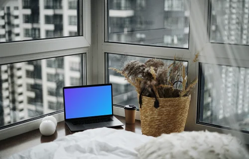 MacBook Pro mockup in a luxury bedroom