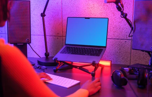 MacBook Pro mockup with a vibrant gaming setup