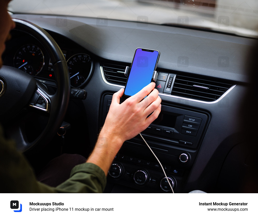 Un conducteur place l'iPhone 11 mockup dans un support de voiture
