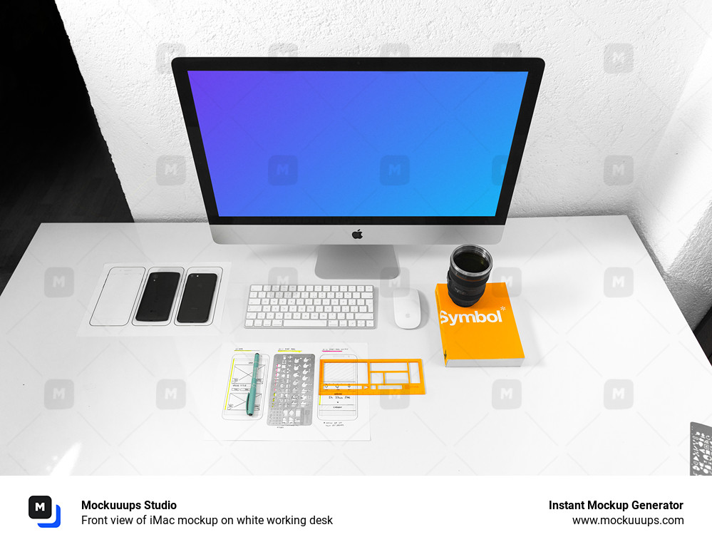 Vue de face d'un iMac mockup sur un bureau de travail blanc