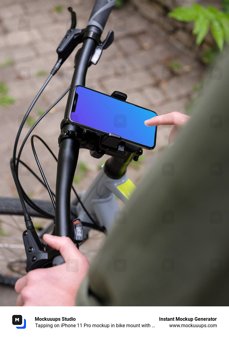 Tapping sur l'iPhone 11 Pro mockup dans un support pour vélo avec le guidon sur le côté.