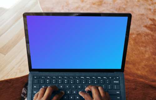 L'ordinateur portable Surface de Microsoft à portée de main mockup