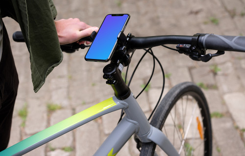 Assis sur un vélo avec un iPhone Pro 11 mockup dans un support de vélo