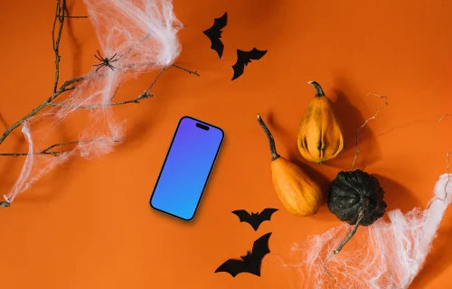 Fond d'écran d'Halloween mockup avec un smartphone et des chauves-souris