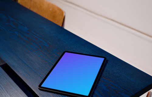 iPad Air mockup on a blue table mockup