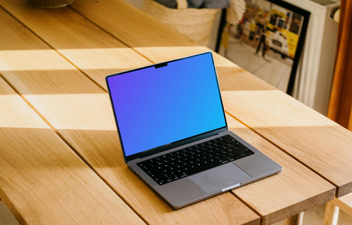 MacBook Pro mockup opened up on a table