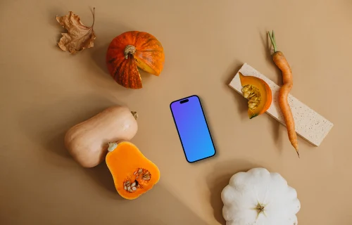 Téléphone mockup à côté des légumes