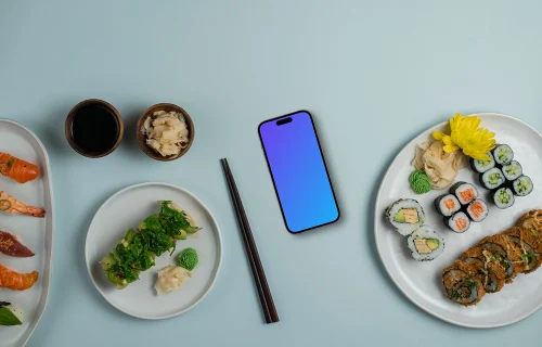 Plusieurs rouleaux de sushi avec un smartphone mockup