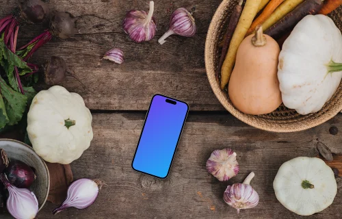 Smartphone mockup entouré de légumes