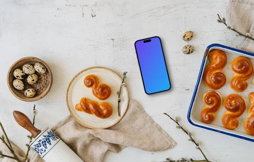 Smartphone mockup with baked Easter pastries