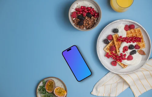 Smartphone mockup avec assiettes de petit-déjeuner