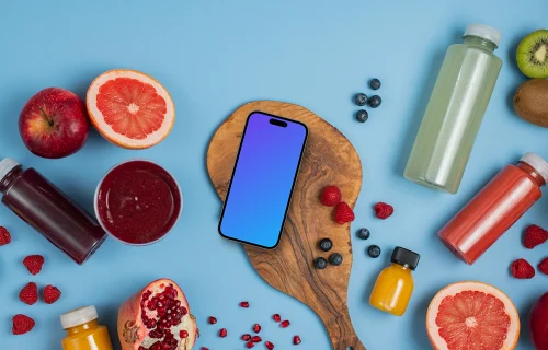 Smartphone mockup avec des jus de fruits