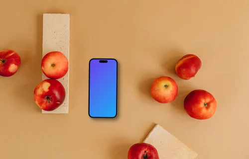 Vue de dessus du smartphone mockup à côté de pommes