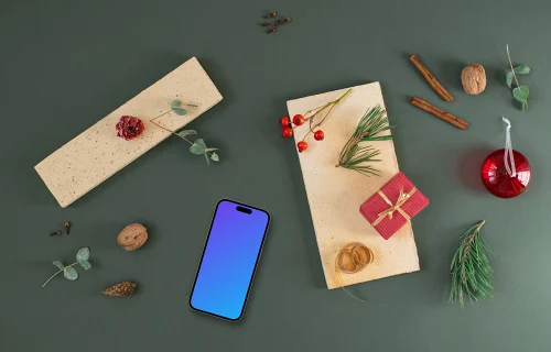 Top view of smartphone mockup with christmas decoration