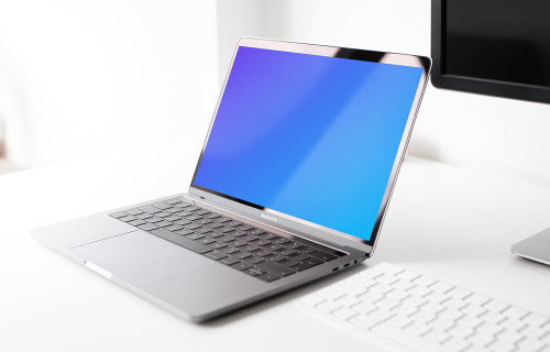 Vue claire du Macbook Pro mockup sur la table