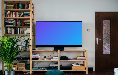 Télévision mockup sur un support de table en bois